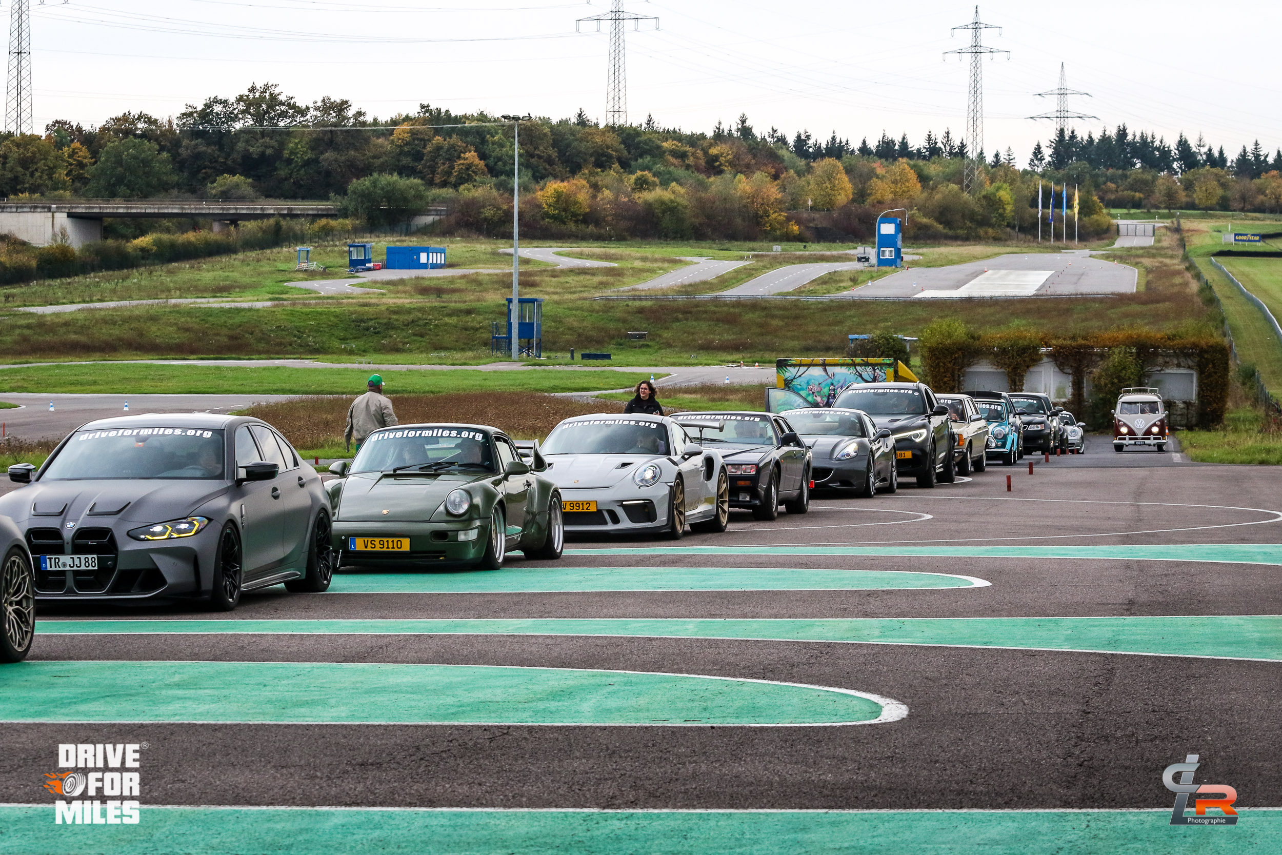 Sports cars lined up on a race track